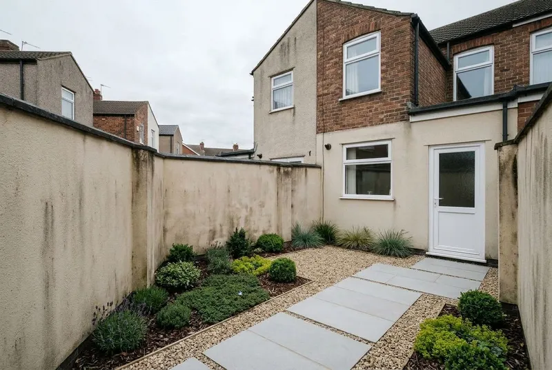A courtyard garden redesigned in the Low Maintenance garden style
